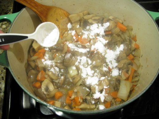 adding arrowroot to cooked vegetables to thicken the sauce for jewish beef brisket recipe