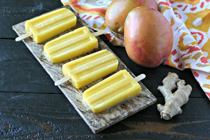 Creamy Spiced Mango Popsicles from www.EverydayMaven.com