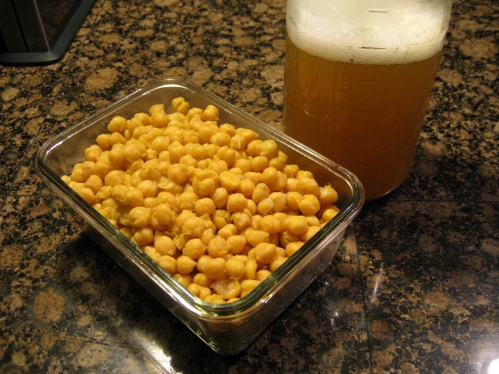 leftover cooked chickpeas and cooking liquid in glass containers
