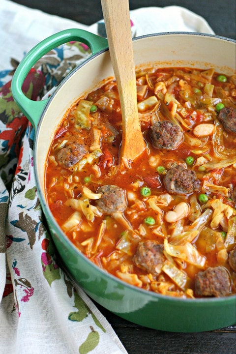 Italian Sausage Meatball Soup with Cabbage and White Beans from www.EverydayMaven.com