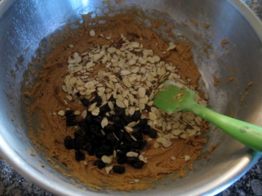 adding dried cherries and sliced almonds to mandel bread batter