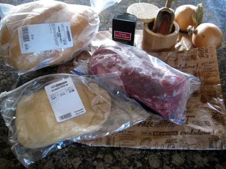 Ingredients to make cheese steak sandwiches