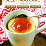 close up of peanut butter mug cake topped with strawberry jelly