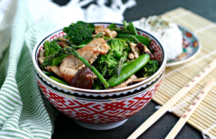 Chicken Stir Fry with Asparagus, Broccoli, Snap Peas and Mushrooms in a Bowl