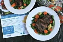 photo of Flat Iron Steak and Vegetable Dinner with napkin and recipe card on table