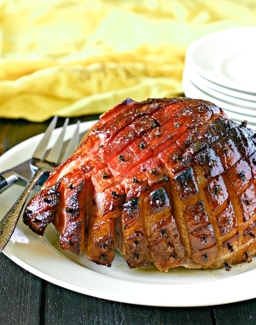 maple glazed smoked ham with serving plates