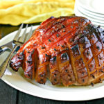close up of cooked smoked ham with spiced glaze
