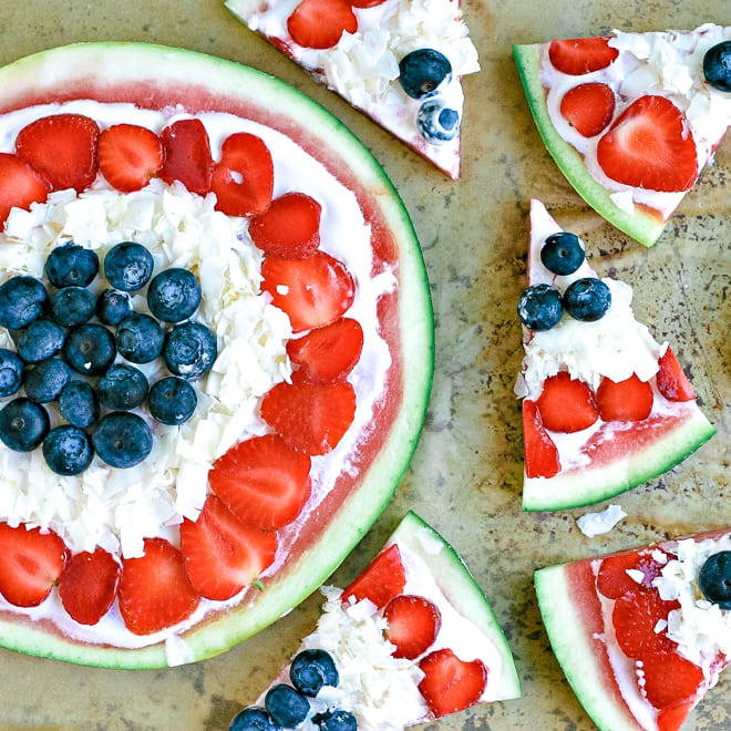 close up of fruit pizza with watermelon, berries and non-dairy yogurt