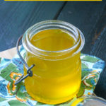 close up of warm homemade ghee in a glass jar