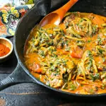 close up of paprika chicken in a cast-iron skillet