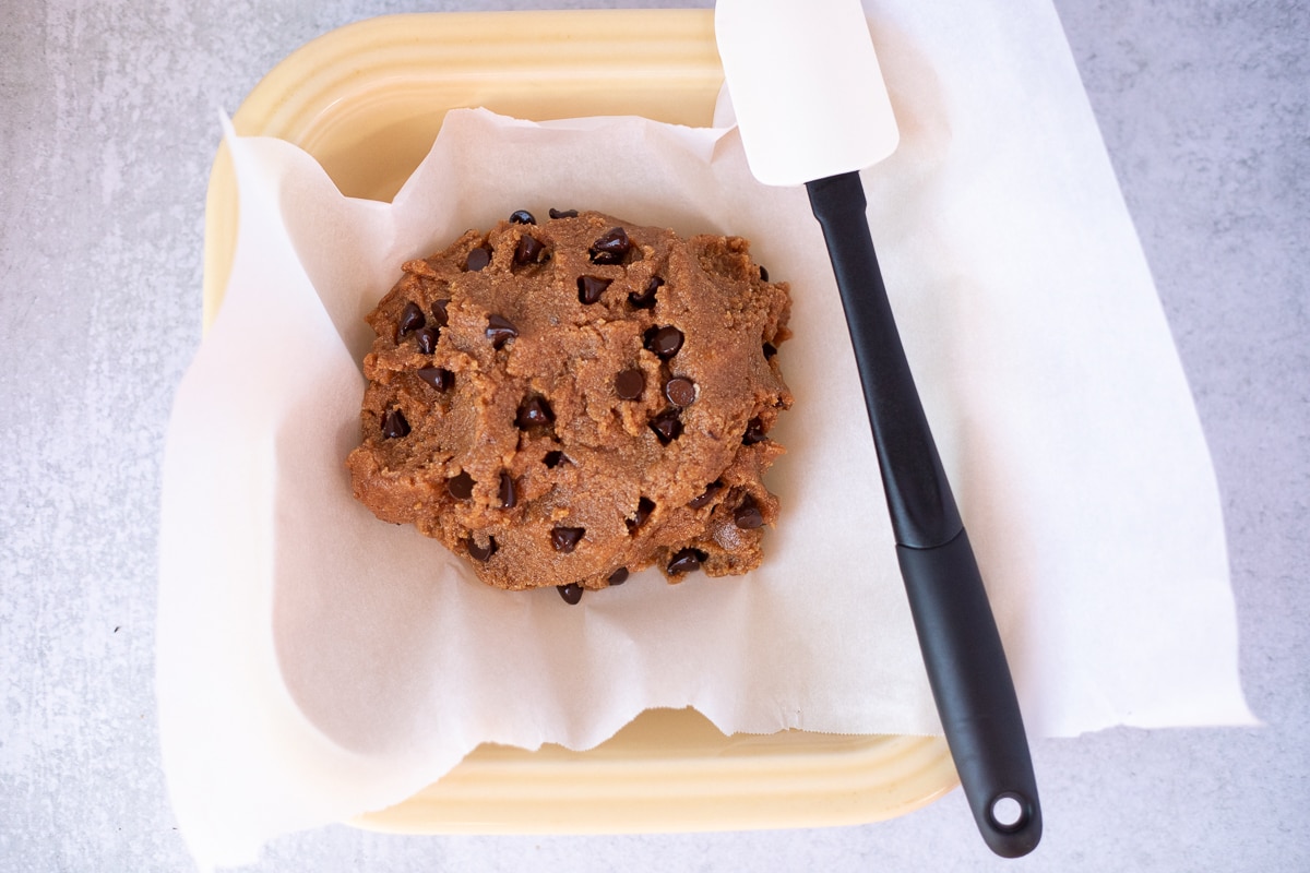 gluten free blondie dough with chocolate chips in a baking dish