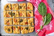 squares of grain free focaccia with fresh basil